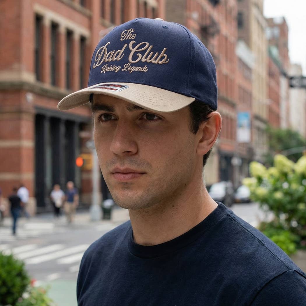 The Dad Club Raising Legends Embroidered Trucker Hat: DKGRN/NATL / ONE SIZE